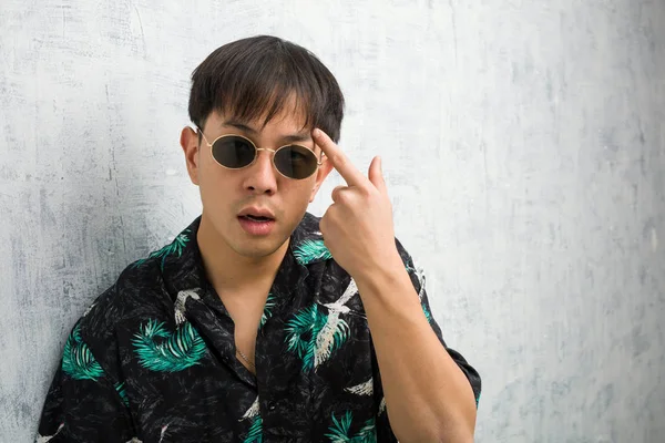 Young Chinese Man Wearing Summer Outfit Doing Disappointment Gesture Finger — 스톡 사진