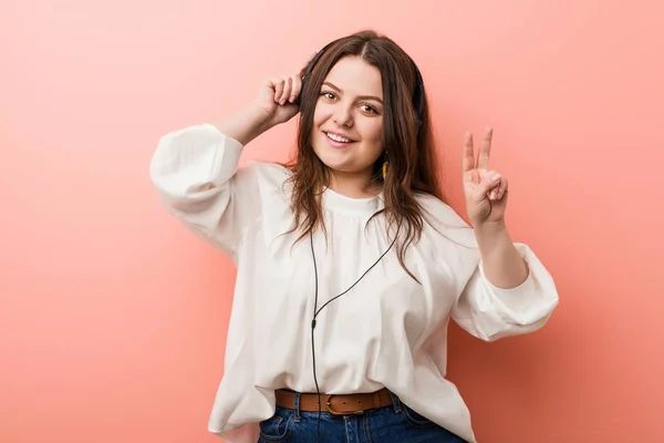 Young Size Curvy Woman Listening Music Headphones Showing Victory Sign — 스톡 사진