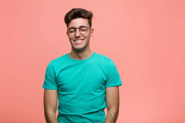 Young Cool Caucasian Man Laughs Closes Eyes Feels Relaxed Happy — Stock Photo, Image