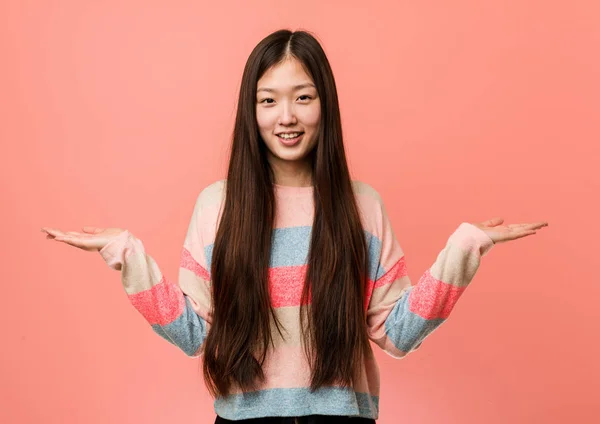 Young Cool Chinese Woman Makes Scale Arms Feels Happy Confident — 스톡 사진