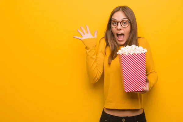 Young Pretty Caucasian Woman Celebrating Victory Success She Eating Popcorns — Stock Photo, Image