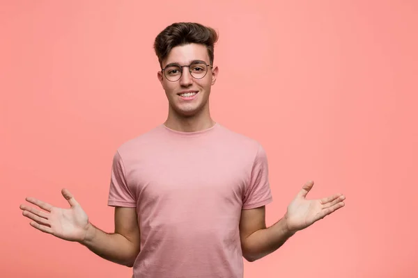 Young Cool Caucasian Man Showing Welcome Expression — Stock Photo, Image