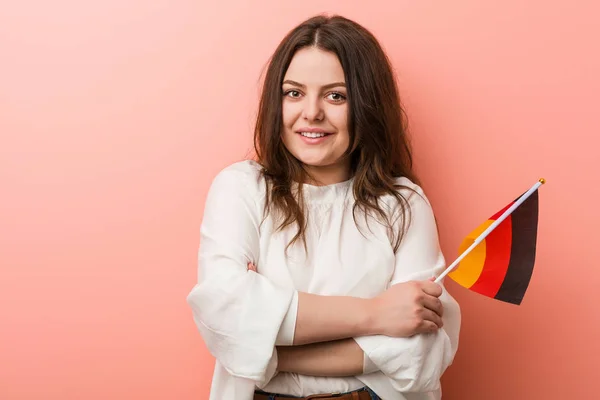 Young Curvy Size Woman Holding Germany Flag Smiling Confident Crossed — 스톡 사진