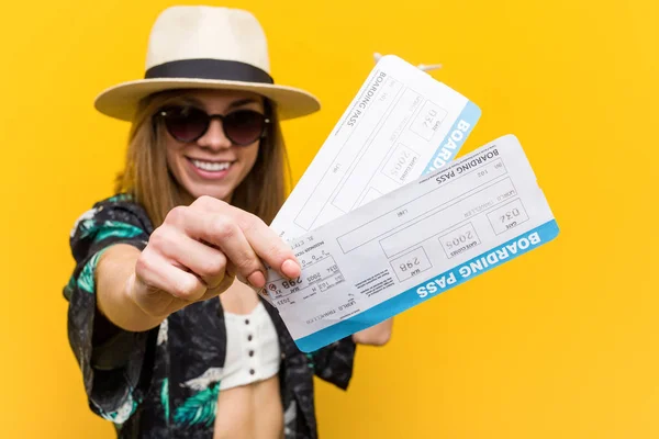 Young caucasian woman holding air tickets very happy. — Stock Photo, Image