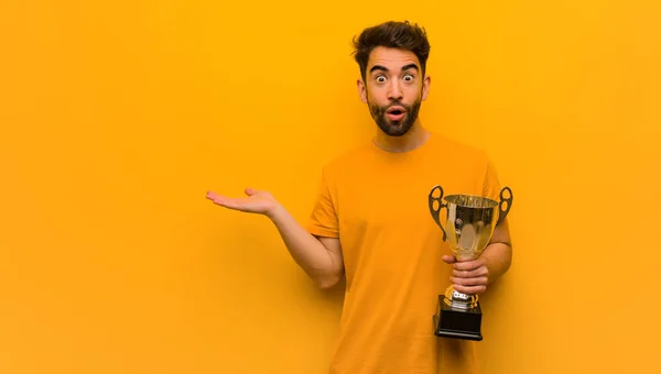 Young Man Holding Trophy Holding Something Palm Hand — Stock Photo, Image