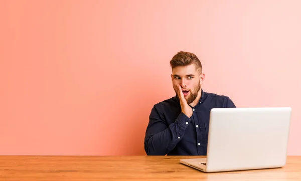 Young Man Working His Laptop Saying Secret Hot Braking News — 스톡 사진