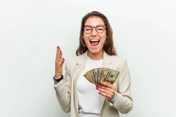 Young European Business Woman Holding Dollar Banknotes Celebrating Victory Success — 스톡 사진