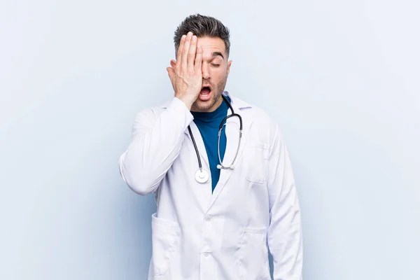 Young Handsome Doctor Man Having Fun Covering Half Face Palm — Stock Photo, Image