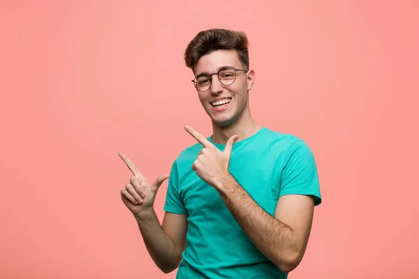 Young Cool Caucasian Man Pointing Forefingers Copy Space Expressing Excitement — Φωτογραφία Αρχείου