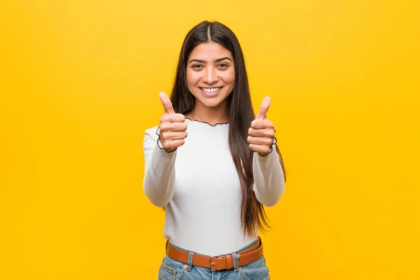 Young Pretty Arab Woman Yellow Background Thumbs Ups Cheers Something — 스톡 사진