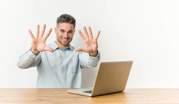 Young Handsome Man Working His Laptop Showing Number Ten Hands — Stock Photo, Image