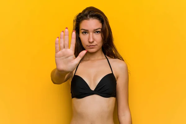 Young European Woman Wearing Bikini Standing Outstretched Hand Showing Stop — 스톡 사진