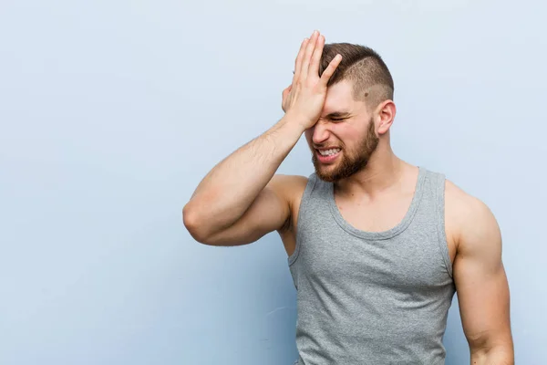 Young Handsome Fitness Man Forgetting Something Slapping Forehead Palm Closing — Stock Photo, Image