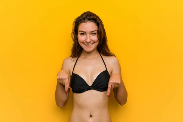 Young European Woman Wearing Bikini Points Fingers Positive Feeling — Stok fotoğraf