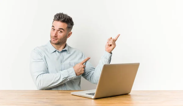 Young Handsome Man Working His Laptop Smiling Cheerfully Pointing Forefinger — Stock Photo, Image