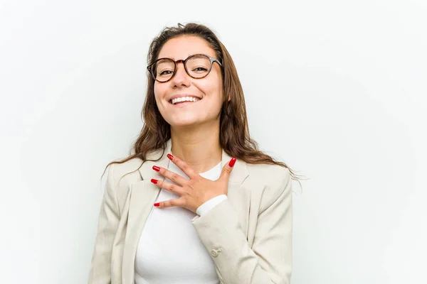 Young European Business Woman Laughs Out Loudly Keeping Hand Chest — 스톡 사진