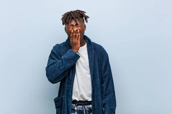 Young African Black Man Wearing Pajama Yawning Showing Tired Gesture — 스톡 사진