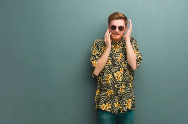 Young Redhead Man Wearing Exotic Summer Clothes Desperate Sad — Stock Photo, Image