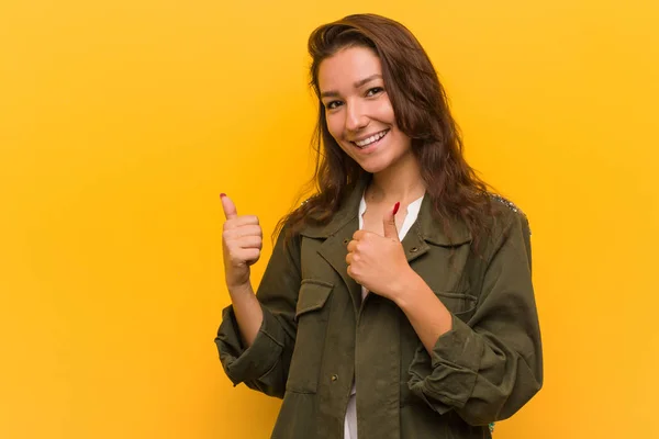 Young European Woman Isolated Yellow Background Raising Both Thumbs Smiling — 스톡 사진