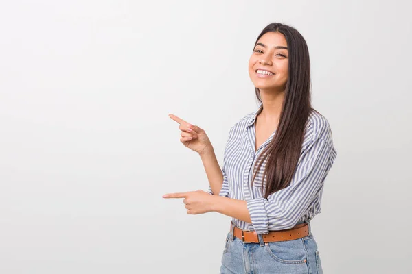 Young Pretty Arab Woman Excited Pointing Forefingers Away — Stock Photo, Image