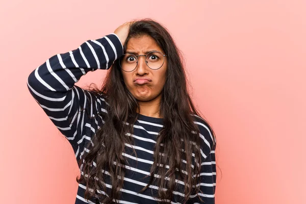 Young intellectual indian woman being shocked, he has remembered important meeting.