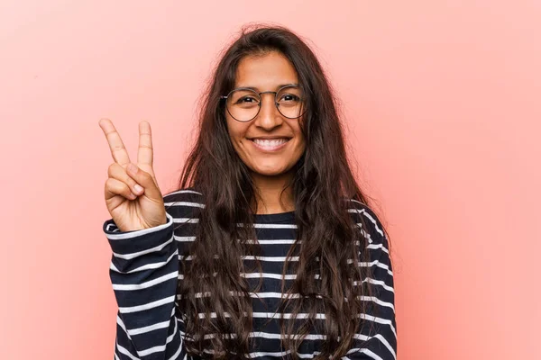 Young intellectual indian woman showing number two with fingers.