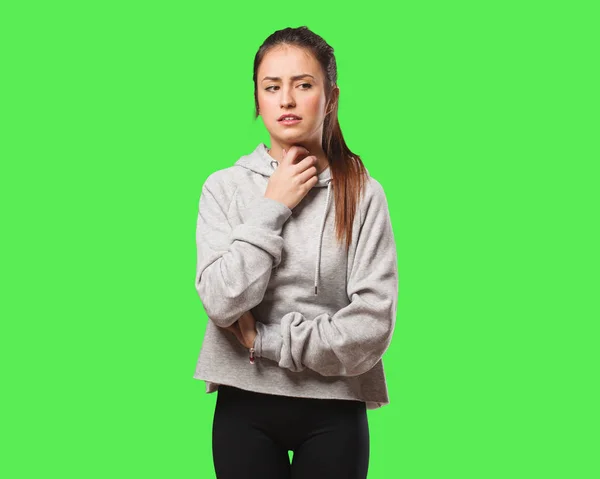 Young fitness woman coughing, sick due a virus or infection