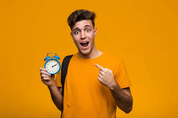 Young Student Man Holding Alarm Clock Showing Fist Camera Aggressive — ストック写真