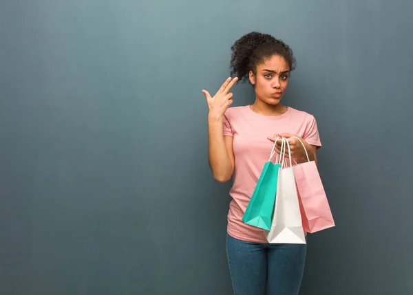 Young Black Woman Doing Suicide Gesture She Holding Shopping Bags — 스톡 사진