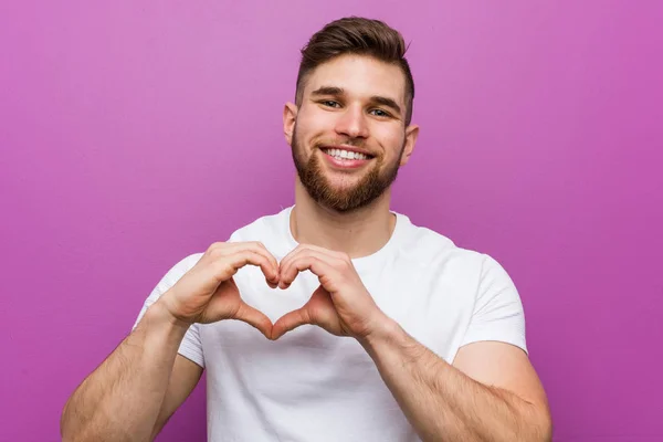 Young Handsome Caucasian Man Smiling Showing Heart Shape Him Hands — 스톡 사진