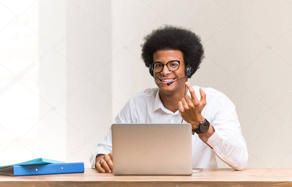 Young telemarketer black man inviting to come