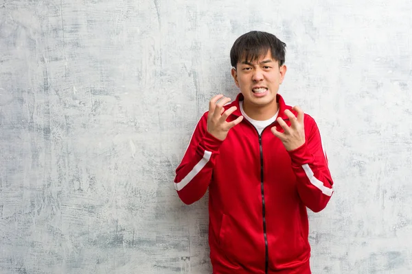 Jovem Esporte Fitness Chinês Irritado Chateado — Fotografia de Stock