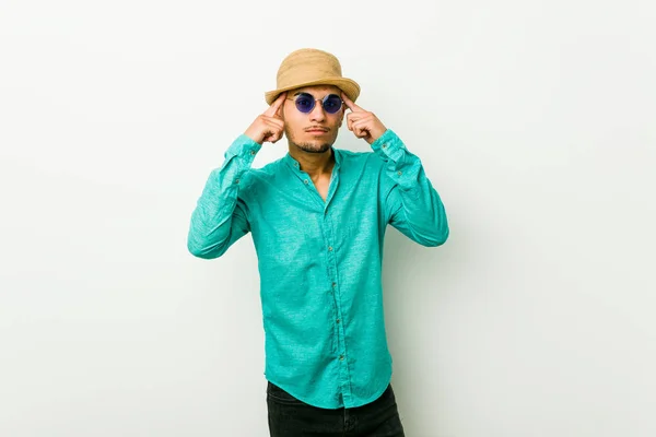 Young Hispanic Man Wearing Summer Clothes Focused Task Keeping Forefingers — Stock Photo, Image
