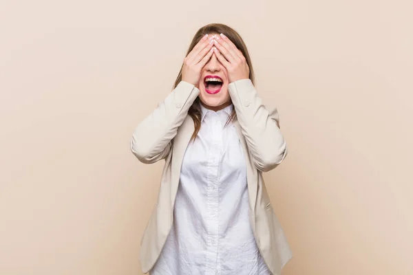 Young Business Woman Covers Eyes Hands Smiles Broadly Waiting Surprise — Stock Photo, Image