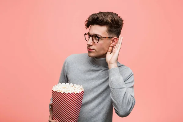 Young Intellectual Man Holding Popcorn Bucket Smiling Confident Crossed Arms — Stock Photo, Image