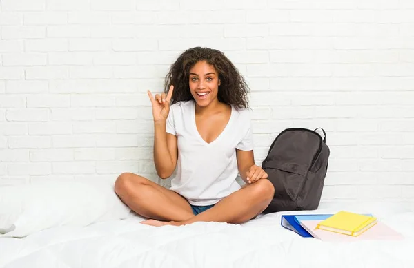 Young African American Student Woman Bed Showing Horns Gesture Revolution — Stock Photo, Image