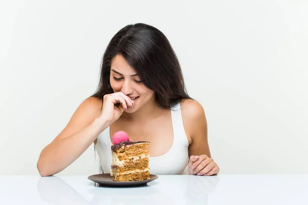 Young Hispanic Woman Eating Carrot Cake — Stock Photo, Image