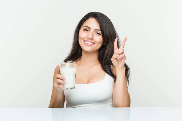Young Hispanic Woman Holding Glass Milk Showing Number Two Fingers — Stock Photo, Image