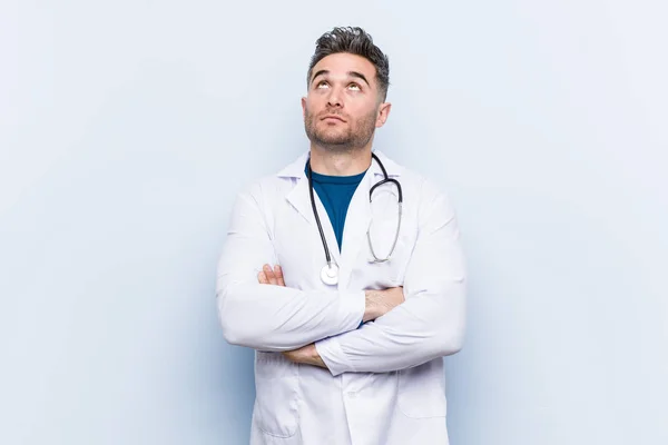 Young Handsome Doctor Man Tired Repetitive Task — Stock Photo, Image