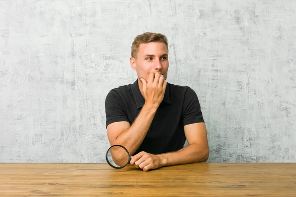 Young Handsome Man Holding Magnifying Glass Biting Fingernails Nervous Very — Stock Photo, Image