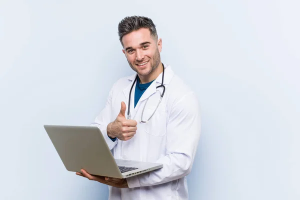 Caucasian Doctor Man Holding Laptop Smiling Raising Thumb — Stock Photo, Image