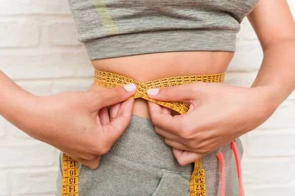 Young Caucasian Woman Measuring Her Waist — Stock Photo, Image