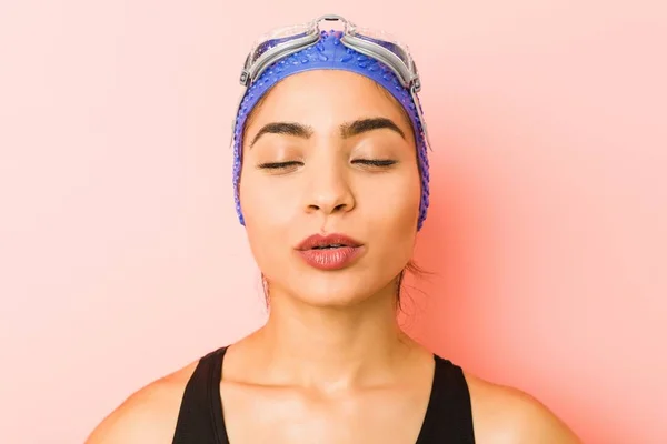 Close up of a young arab swimmer woman