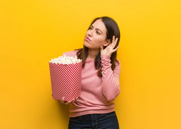 Young Cute Woman Holding Popcorn Bucket Try Listening Gossip — Stock Photo, Image