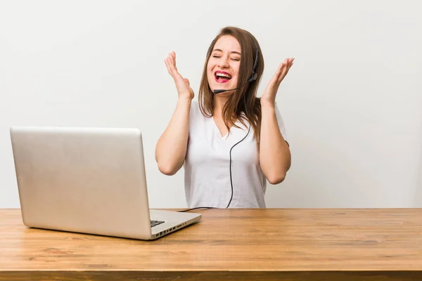 Young telemarketer woman joyful laughing a lot. Happiness concept.