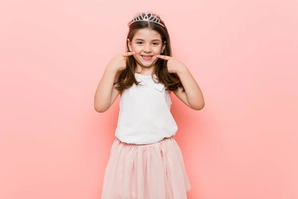 Little Girl Wearing Princess Look Smiles Pointing Fingers Mouth — Stock Photo, Image