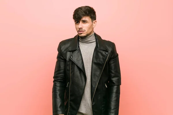 Young Hispanic Man Wearing Leather Jacket Confused Feels Doubtful Unsure — Stock Photo, Image