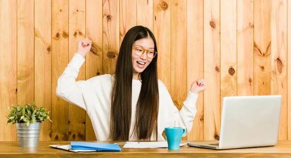 Young Chinese Woman Studying Her Desk Dancing Having Fun — стокове фото