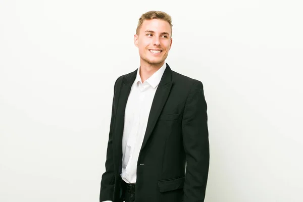 Young Caucasian Business Man Looks Aside Smiling Cheerful Pleasant — Stock Photo, Image