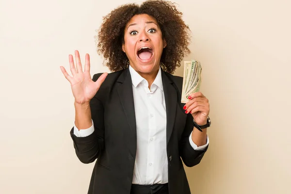 Young African American Woman Holding Dollars Celebrating Victory Success — Stock Photo, Image